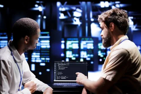 IT developers write server script code Stock Photos