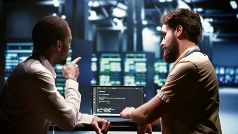IT developers writing server script code Stock Footage 246241326