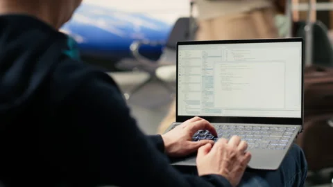 IT engineer creating scripts and managing databases for web platform Stock Footage 333172120