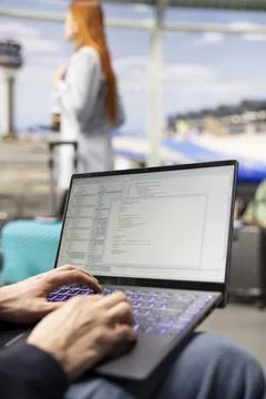 IT engineer creating scripts and managing databases for web platform Stock Photos