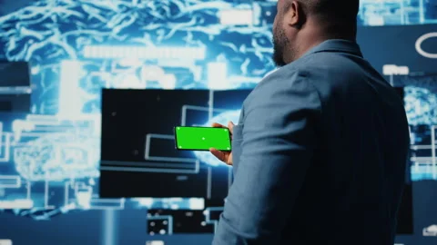 IT engineer in a high tech space uses copy space display with AI modern tools Stock Footage 312359538
