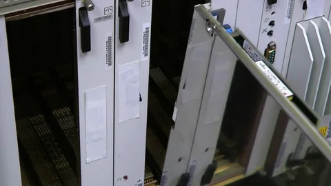 IT engineer insert optical patch cord in card on datacenter. Stock Footage 82753380