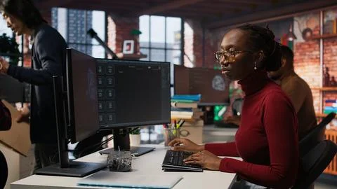 IT engineer interacts with AI LLM chatbot on PC in software development startup 스톡 사진