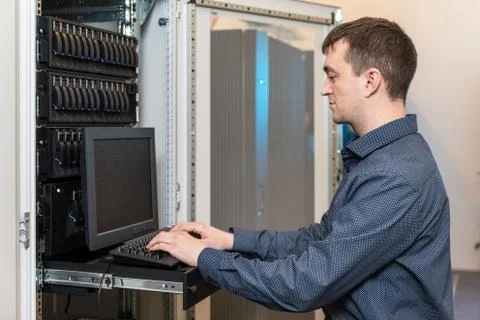 IT engineer with the management console Stock Photos