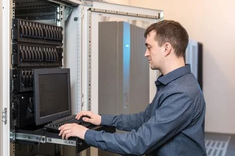 IT engineer with the management console Stock Photos