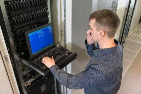 IT engineer with the management console Stock Photos