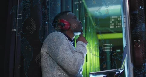 IT engineer noticing tablet alert, inspecting rack while animated world-map Stock Footage 331429404