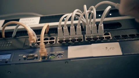IT Engineer Patching Network Equipment In Server Room. 動画素材 104178460