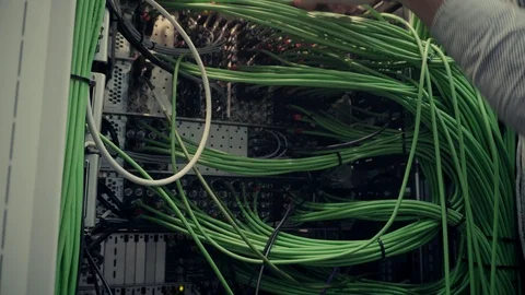 IT Engineer Patching Network Equipment In Server Room. 库存影片 104180110
