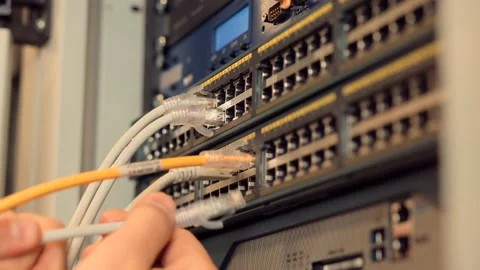 IT Engineer Patching Network Equipment In Server Room.It Data Center Video stock 150689739