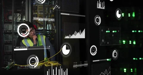 IT engineer powering laptop and plugging cables in data center while scanning Stock Footage 313758526