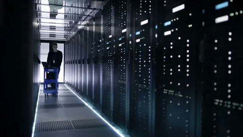 IT Engineer Pushes Crash Cart in the Data Center Corridor 動画素材 73890407