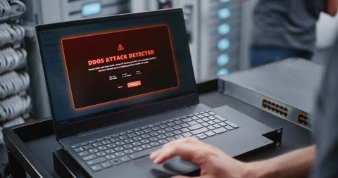 IT Engineer Responding to DDoS Attack Alert Through Linux CLI in Data Center Stock Footage 344967321