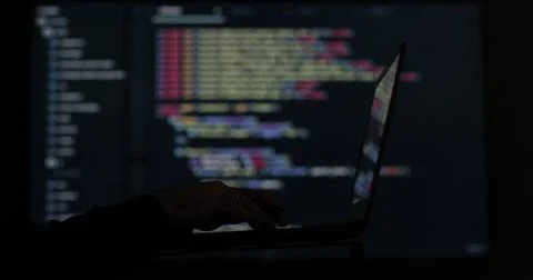 IT engineer, software developer, programmer interacts with a chatbot by creating Stockfoto's