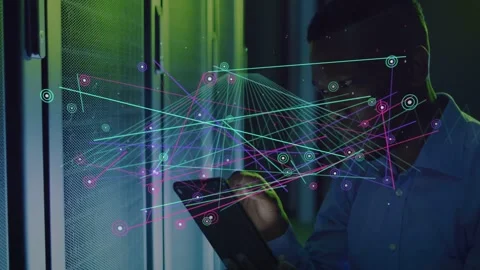 IT engineer tapping tablet, watching nodes and lines expanding and converging Stock Footage 331713582