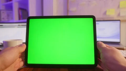 IT engineer using green screen tablet to learn how to use AI LLM chatbot on Stock Footage 300952760