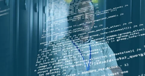 IT engineer wearing lanyard standing against server racks, code overlay Stock Footage 313494128