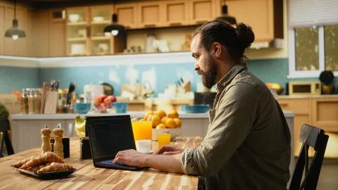 IT engineer working remotely, coding on laptop, programming scripts 스톡 사진