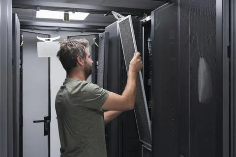 IT engineer working In the server room or data center The technician puts in a 스톡 사진