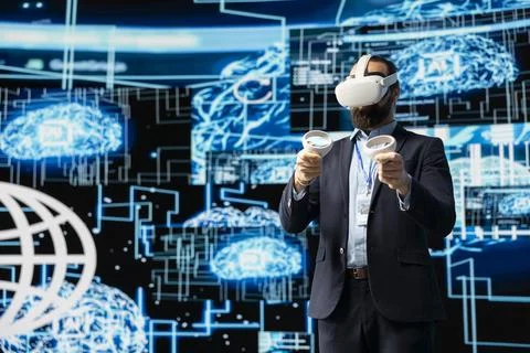 IT engineer works with vr headset and artificial intelligence brain Stock Photos