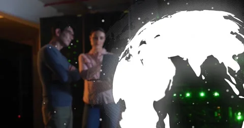 IT engineers analyzing server racks in data center, highlighting floating code Stock Footage 330255037