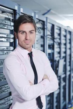 It engineers in network server room Stock Photos