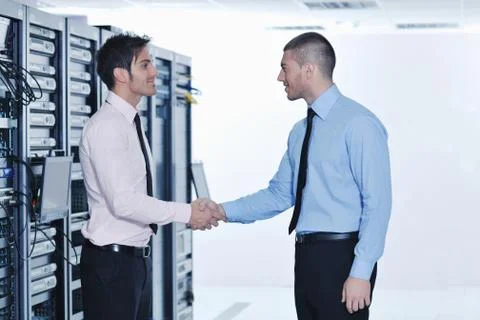 It engineers in network server room Stock Photos