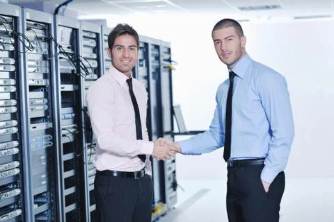 It engineers in network server room Stock Photos
