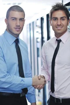 It engineers in network server room Stock Photos