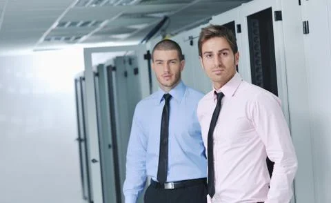 It engineers in network server room Stock Photos