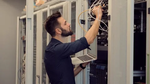 It enginer in server room.programmer in data center.network engineer Stock Footage 260891645