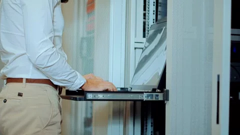 It enginer in server room.programmer in data center.network engineer Stock Footage 260930459