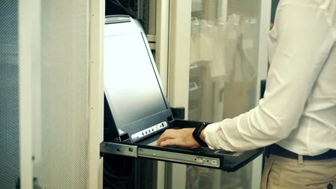 It enginer in server room.programmer in data center.network engineer Stock Footage 261140998