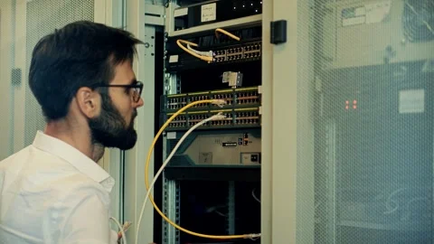 It enginer in server room.programmer in data center.network engineer Stock Footage 261145460