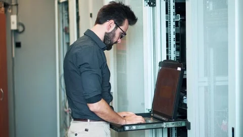 It enginer in server room.programmer in data center.network engineer Stock Footage 261164047