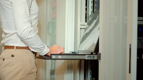 It enginer in server room.programmer in data center.network engineer Stock Footage 261174529