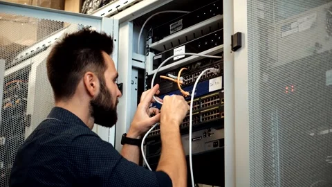 It enginer in server room.programmer in data center.network engineer Stock Footage 261175626