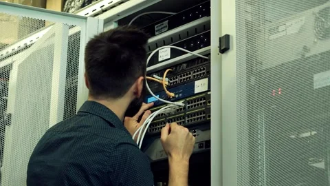 It enginer in server room.programmer in data center.network engineer Stock Footage 261179015