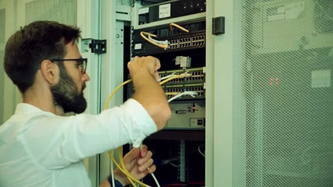 It enginer in server room.programmer in data center.network engineer Stock Footage 261180238