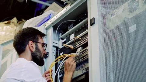 It enginer in server room.programmer in data center.network engineer Stock Footage 261181790