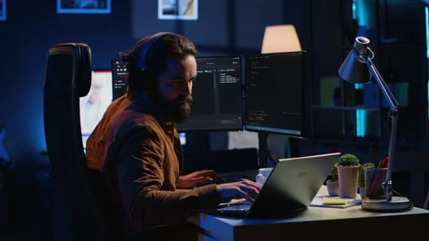 IT expert complaining while solving coding project tasks, suffering from burnout Stock Footage 265343247