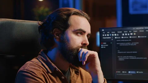 IT expert feeling confused while trying to solve database bugs Stock Footage 265344538