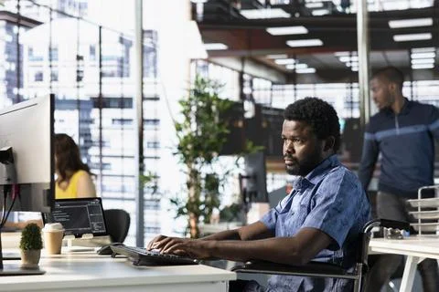 IT expert in office transforming data into predictive models 스톡 사진