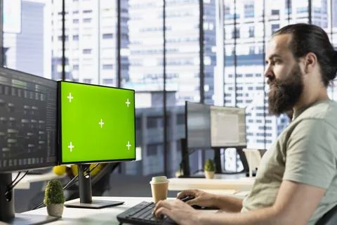IT expert optimizing code on chroma key PC 스톡 사진