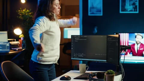 IT expert taking break from work to relax muscles Stock Footage 283691677