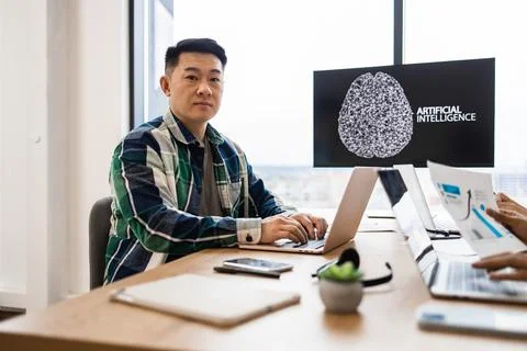 IT expert working on development of artificial intelligence project Stock Photos