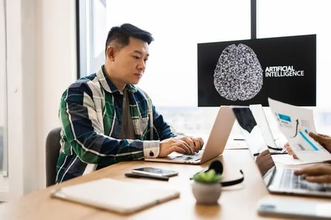IT expert working on developments of artificial intelligence Stock Photos