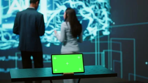 IT experts in high tech location work on chroma key notebook Stock Footage 278622276