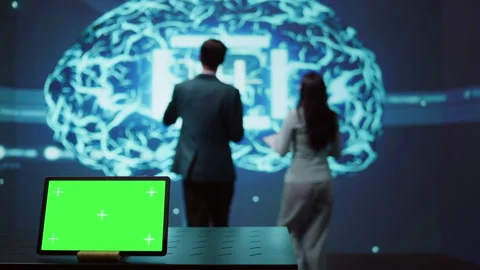 IT experts in high tech location work on chroma key notebook Stock Footage 278623594