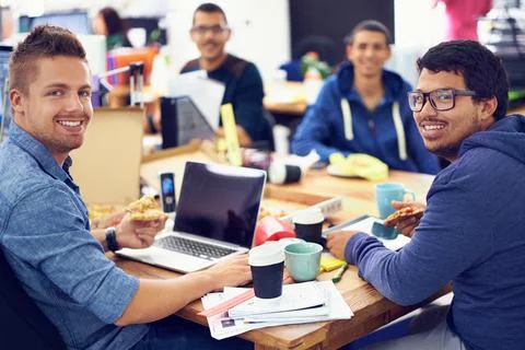 The IT experts. Shot of employees in an IT office. Stock Photos